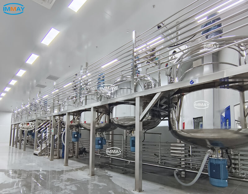 Jacketed stainless steel mixing tank with agitator