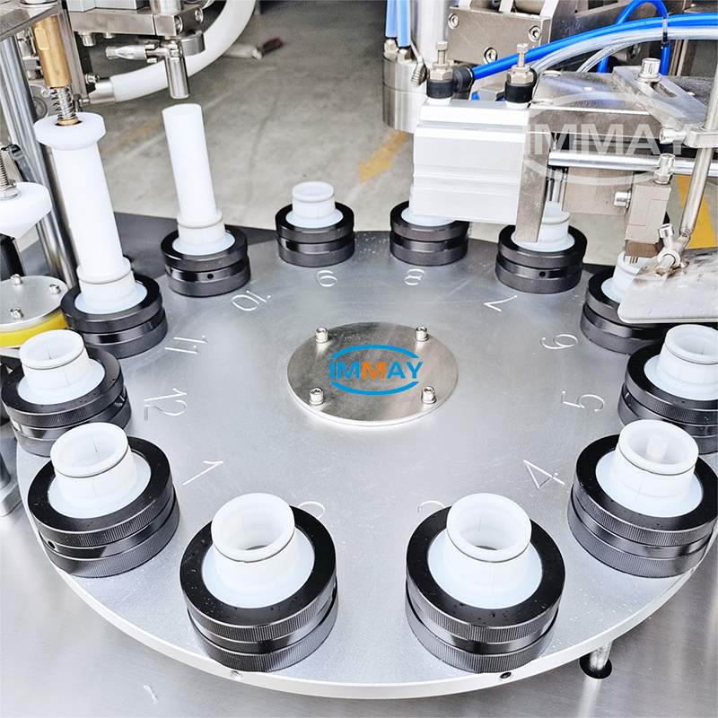 Toothpaste tube filler and sealing machine